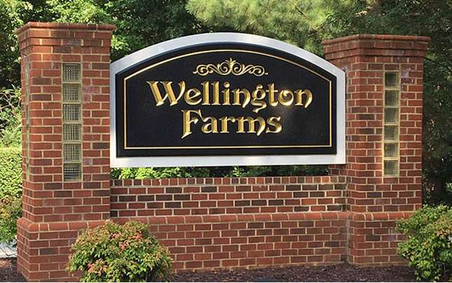 MASONRY SUBDIVISION ENTRY SIGN WITH CARVED HDU FACES, 23 K GOLD-LEAFED
PRISMATIC CARVED LETTERING, BLACK SMALTS BKGD & PVC BACKER PANEL,  CHESTERFIELD, VA