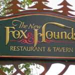 TAVERN SIGN, RAISED AND INCISED PRISMATIC LETTERS WITH CUSTOM STEEL HANGER, HARTFORD, WI