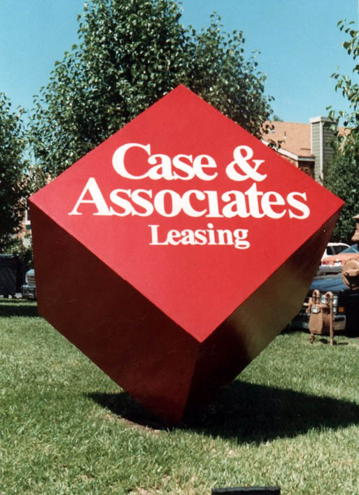 cube shape entrance sign-mounted on corner Case & Associates Leasing